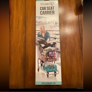 NIB totes baby car seat carrier